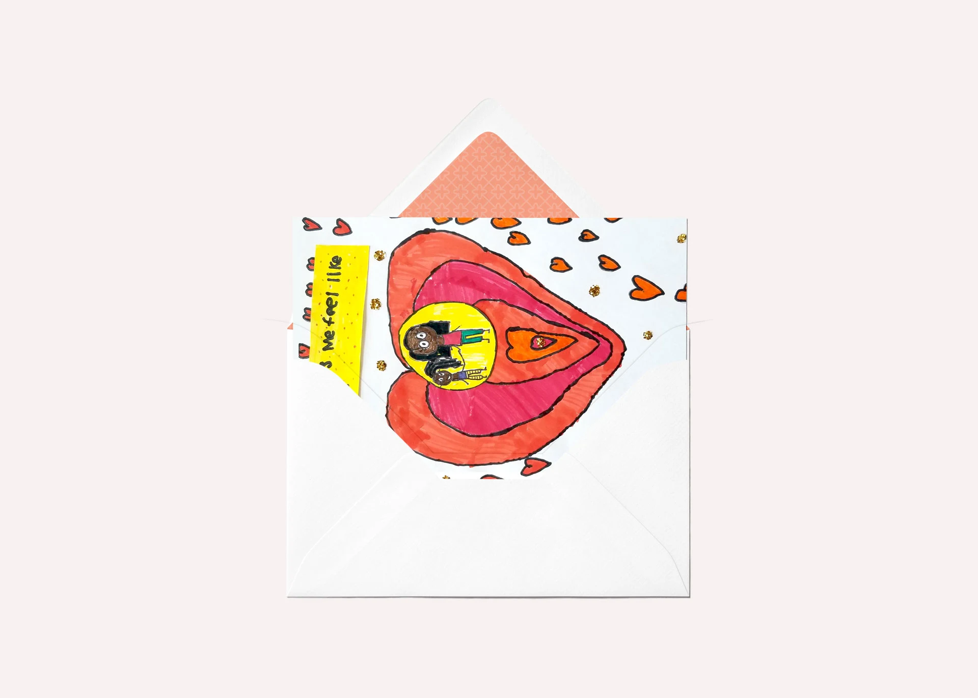 Greeting card mockup featuring a childlike drawing of a mother and daughter surrounded by hearts and the text 'Love Makes Me Feel Like I Can Fly'