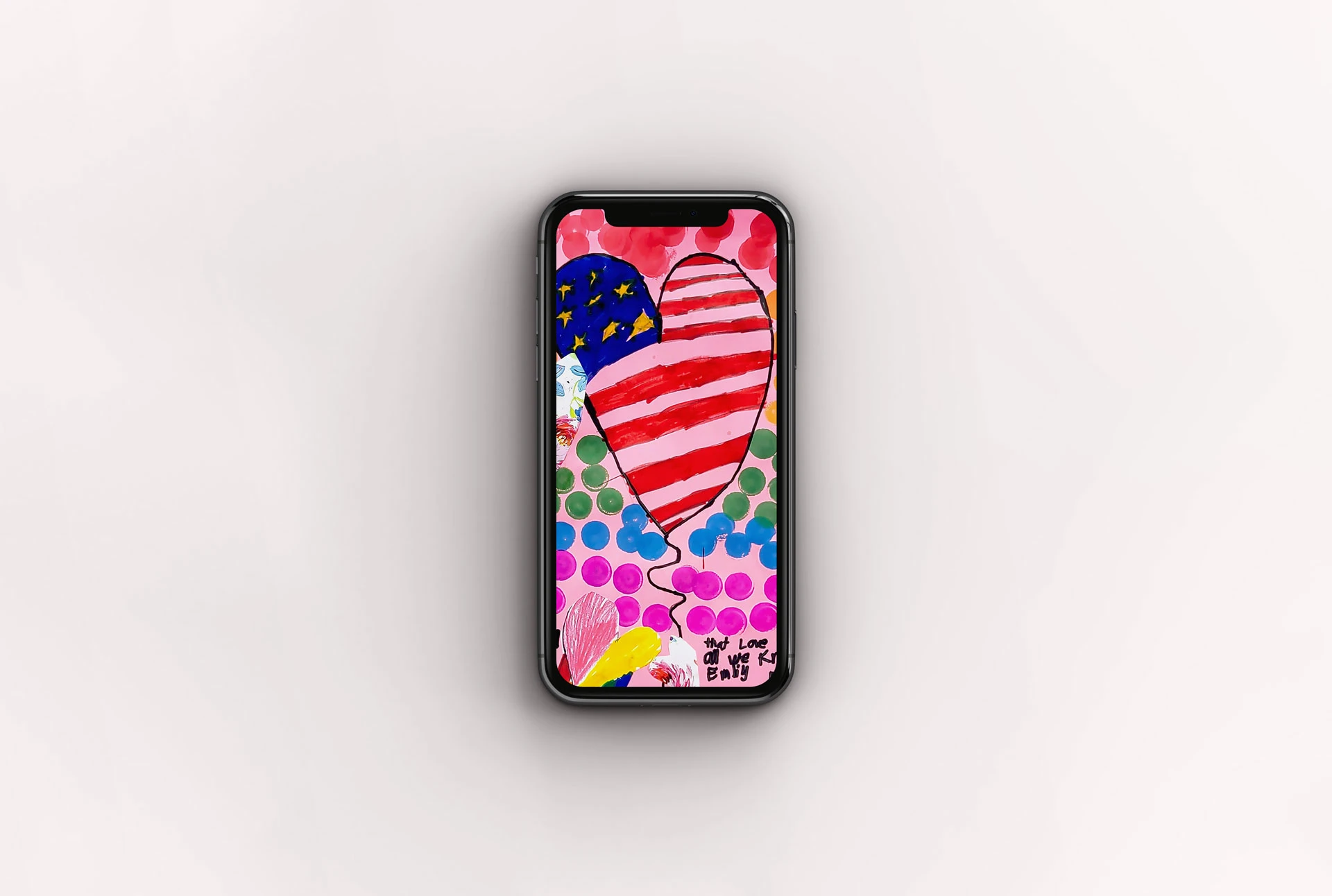 Phone wallpaper mockup featuring a collage of multicolored polka dots, hearts, the American flag, and a quote by Emily Dickinson.